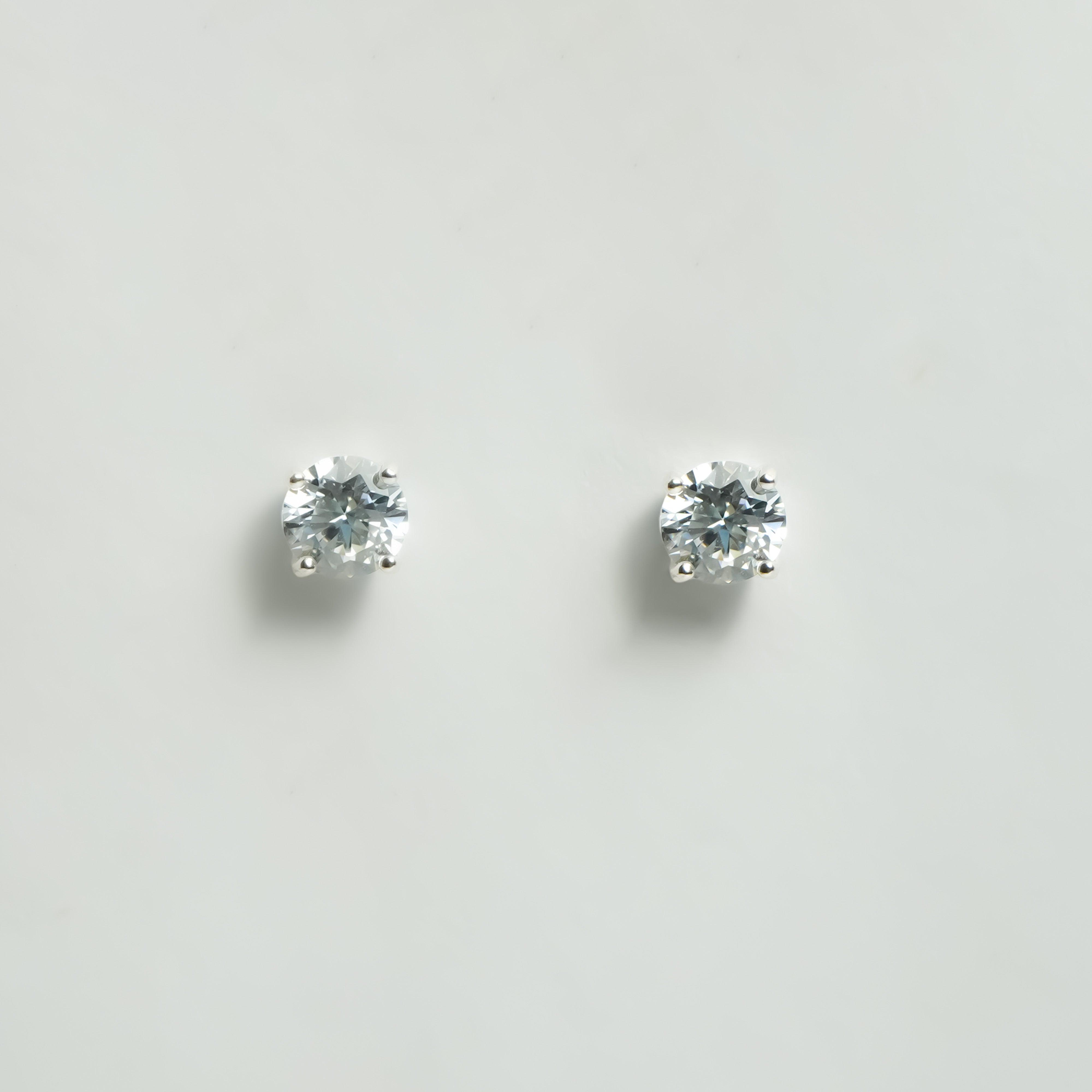 Solitaire Spark Stud Earrings