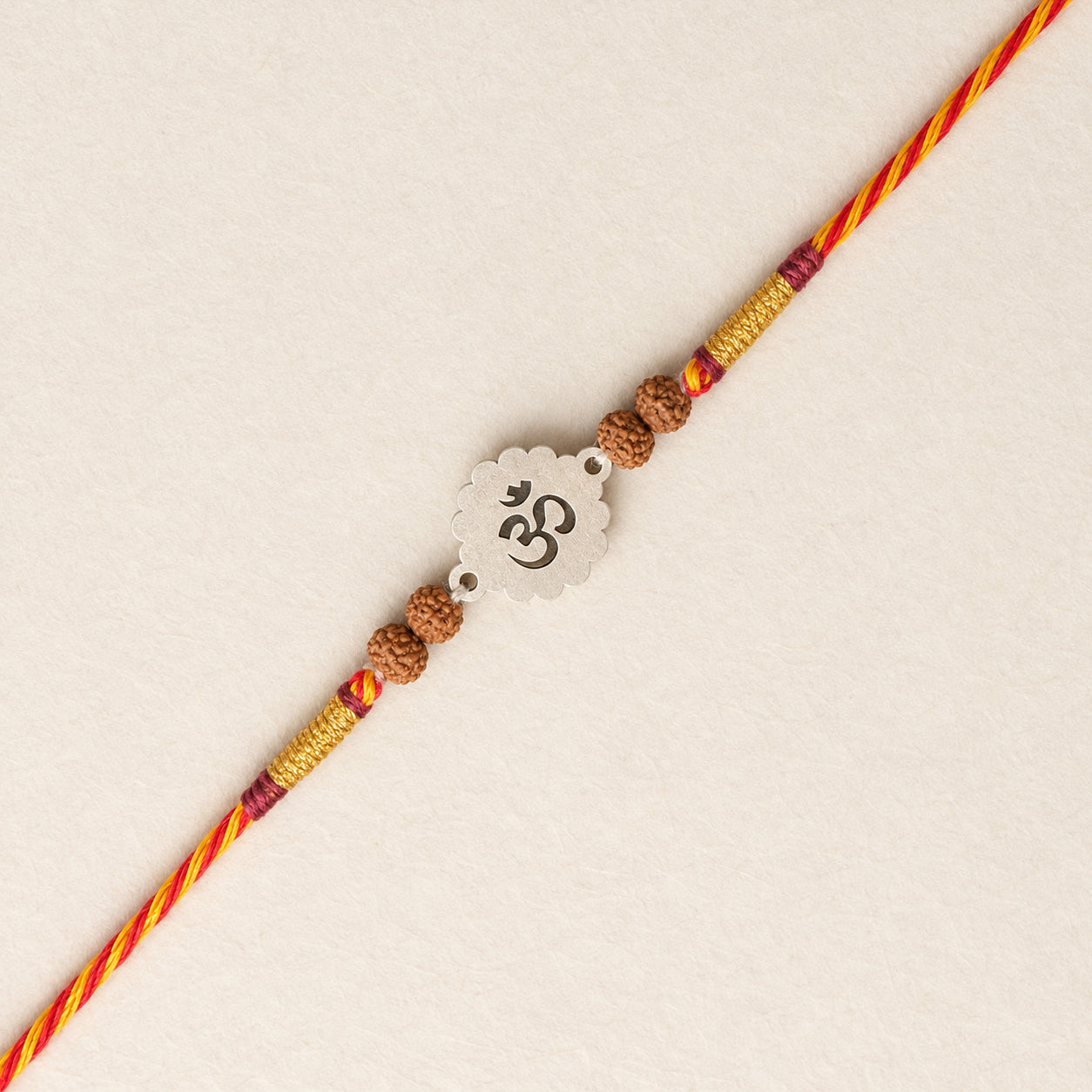 OM 925 Silver Rakhi